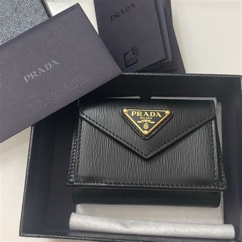 prada trifold wallet price|authentic prada wallet.